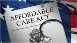 Affordable Care Act document and flag